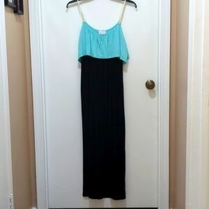 Coveted Clothing Black Turquoise Semi stretch Dress Size L New with No Tag